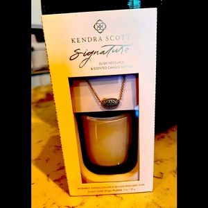 Kendra Scott Signature Series candle and Elisa necklace in gold.